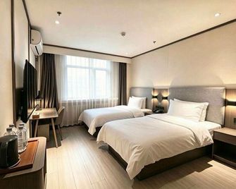Hanting Hotel (Tianjin Olympic Sports Center University of Technology Branch) - Tianjin - Bedroom