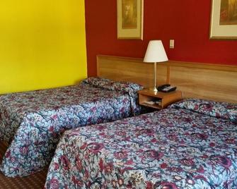 Land of Ahs Motor Inn - Erie - Slaapkamer