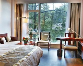 Howard Johnson by Wyndham Huaihai Resort Lushan - Jiujiang - Habitación