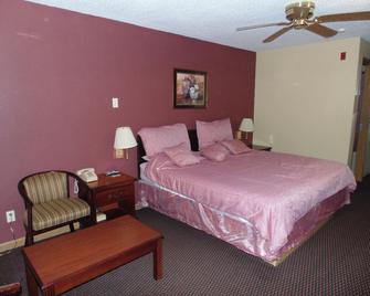 First Western Inn - Fairmont City - Fairmont City - Bedroom