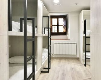 Quartier Leon Hostel Barrio Húmedo - לאון - חדר שינה