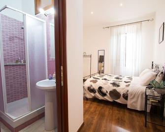 La Dimora di Checchino - Anguillara Sabazia - Slaapkamer