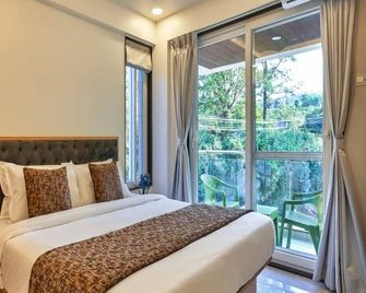 Drizzle Resort - Mahabaleshwar - Bedroom