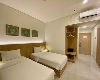 أوبي إندا هوتل - بالمبانغ - غرفة نوم