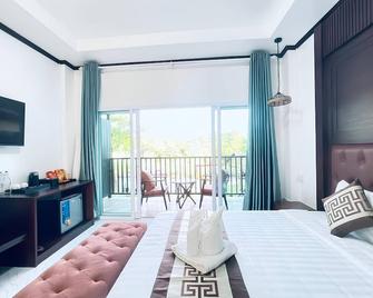 Intimate Riverside Resort - Vang Vieng - Soveværelse