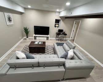 Modern Basement Retreat 2BR King suite - Lawrenceville - Living room