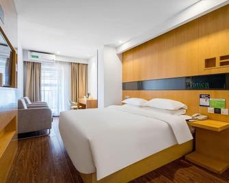 Vatica Xuzhou High Speed Railway Station Hotel - Xuzhou - Schlafzimmer