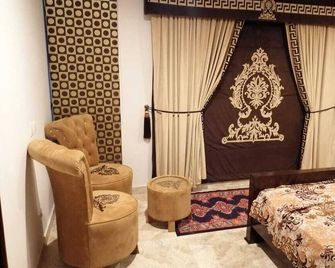 Captivating 1-Bed Apartment fully furnished - Lahore - Bedroom