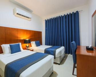 Nova Park Hotel - Sharjah - Bedroom