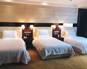 Xibai Hotel - Xining - Camera da letto
