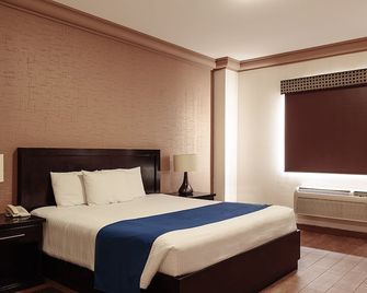 Hotel Conquistador Inn by US Consulate - סיודאד חוארס - חדר שינה
