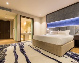 Hotel Lumbini Heritage - Lumbini Sanskritik - Schlafzimmer