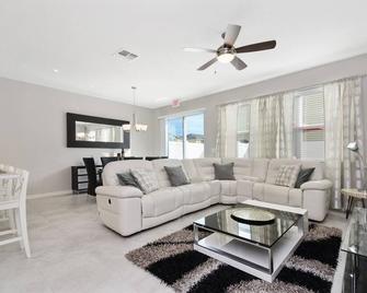 Four Bedrooms at Compass Bay Resort - Kissimmee - Living room