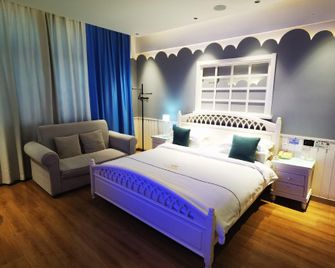 Shijia Boutique Hotel Chain (Kenli Branch) - Dongying - Bedroom