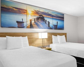 Days Inn by Wyndham Huntington - Huntington - Schlafzimmer