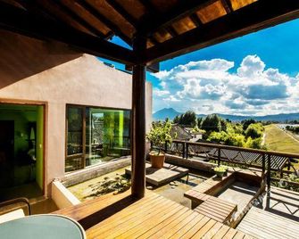 Xianyunxi yuexueshan Garden Resort courtyard - Lijiang - Balcone