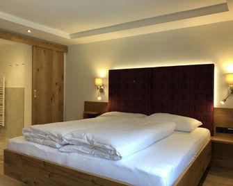 Hotel Garni Central - Zimmer - Studios - Apartments - Kappl - Schlafzimmer