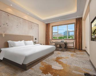 Yutai International Hotel - Shangrao - Bedroom