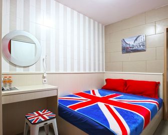 Kamariska Hostel - Perumahan Angkatan Udara - Bedroom