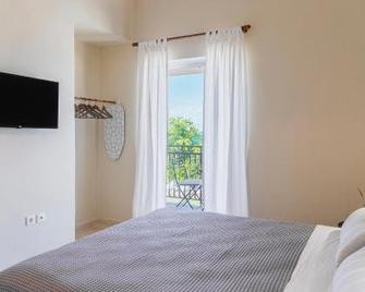 Kamini Apartments - Kavos - Bedroom