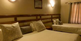 Mopani Lodge - Victoria Falls - Bedroom