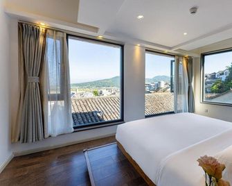 Xinyue Suying Holiday Hotel - Baoshan - Slaapkamer