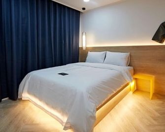 Hotel sounds - Jeonju - Slaapkamer