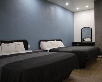 Hotel Villas de Santiago Inn - Tijuana - Schlafzimmer