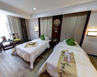 yuan se ya ju hotel - Liaocheng - Schlafzimmer