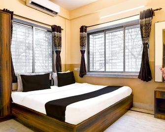 Super Hotel O Rajarhat Near Nkda Stadium Formerly Filoxenia - Колката - Спальня