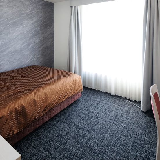 J Hotel Rinku image 1
