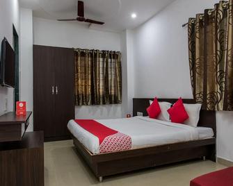 OYO 9969 Hotel Kshipra Dham - Ujjain - Bedroom