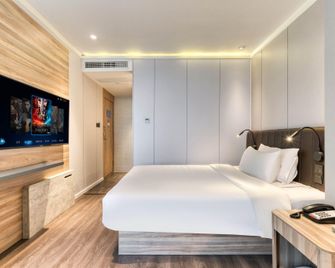 Hanting Premium Hotel Ningbo Tianyi Square - Ningbo - Ložnice