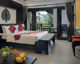 Khmer Mansion Boutique Hotel - סיאם ריפ - חדר שינה