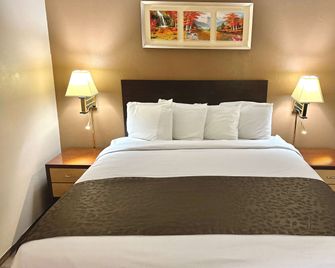 Days Inn by Wyndham Denison IA - Denison - Bedroom