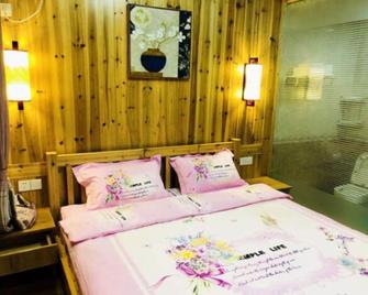 Zhangjiajie Yunqi Inn - Zhangjiajie - Bedroom