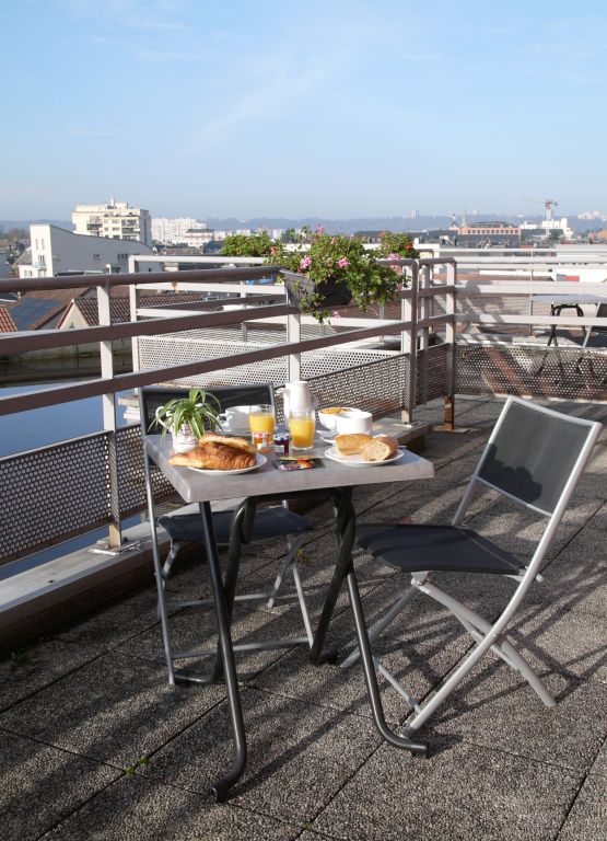 Séjours & Affaires Rouen Normandie - רואה - מרפסת