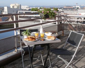 Séjours & Affaires Rouen Normandie - רואה - מרפסת