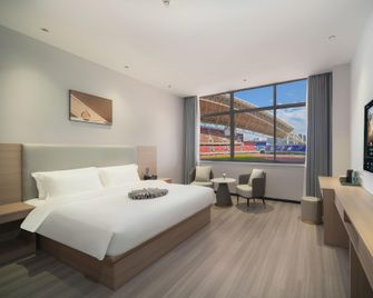 Outlet Cano Hotel (Wanda Plaza Branch) - Weinan - Bedroom