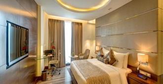 The Hotel Hindusthan International - Poona - Slaapkamer