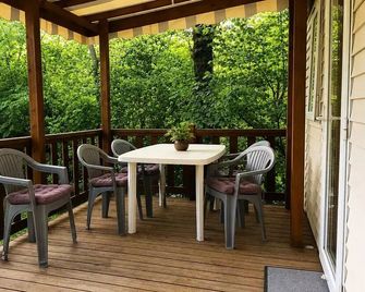 Campsite Uhaitza Le Saison - Mobil-Home O'hara 734 Tribu - 2 bedrooms 7 people - Mauléon-Licharre - Balcony