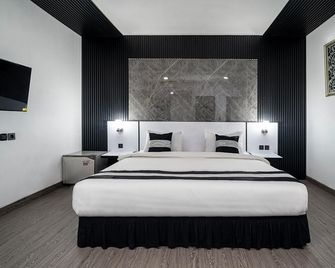 Jl Star Hotel Panakkukang Makassar By Life - ماكاسار - غرفة نوم