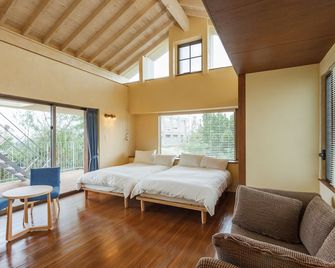 Akabana Inn - Nakijin - Schlafzimmer
