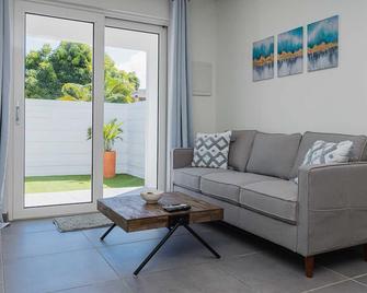 Wlr8 - 1br Near Palm Beach - White Lotus Retreat - Noord - Huiskamer