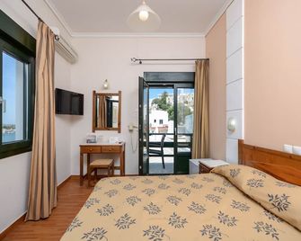 Hotel Coronis - נאקסוס - חדר שינה