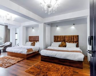 King's Bridge Suites & Spa - דאריילינג - חדר שינה