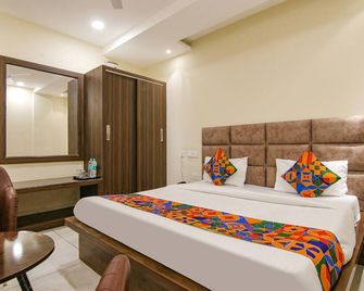 Fabhotel Prism Grand - Zerakpur - Спальня