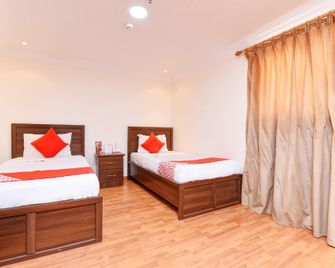 OYO 416 Bonais Hotel - Hofuf - Спальня