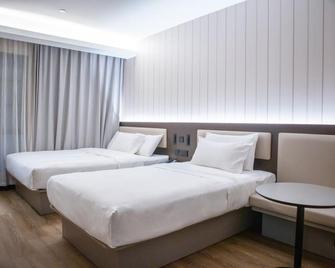 Hanting Hotel Jiande Xinanjiang New Branch - Jinhua - Camera da letto