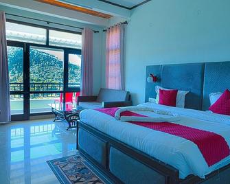 Hotel Spring Birds - Bhimtal - Ložnice